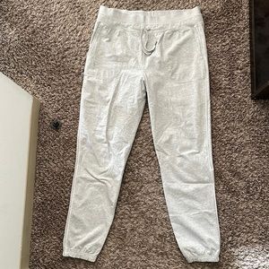 Light grey under armour joggers, size L